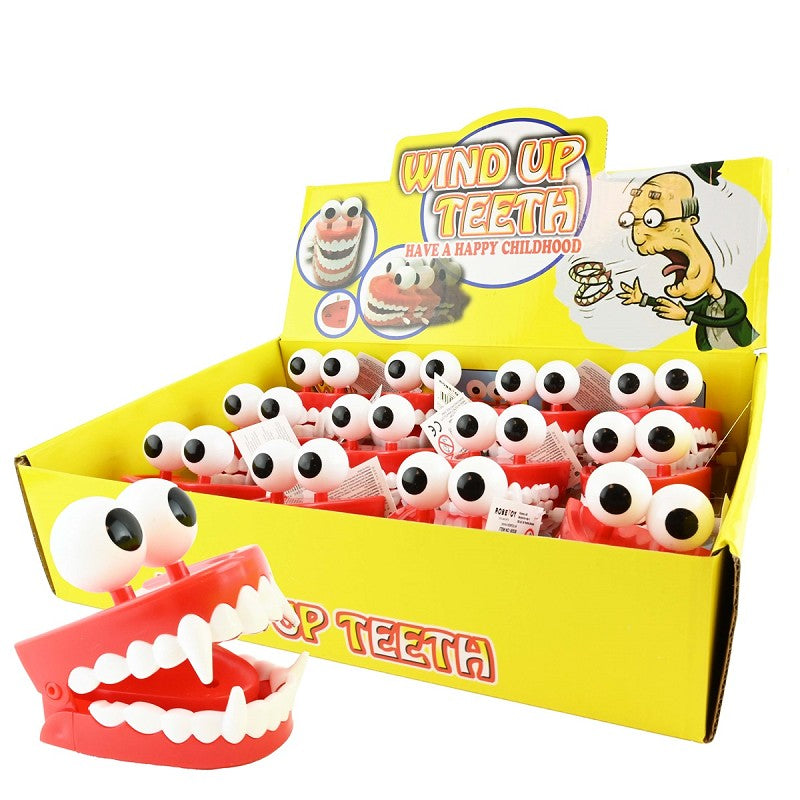 Uppdragna hoppande tänder med ögon 7cm